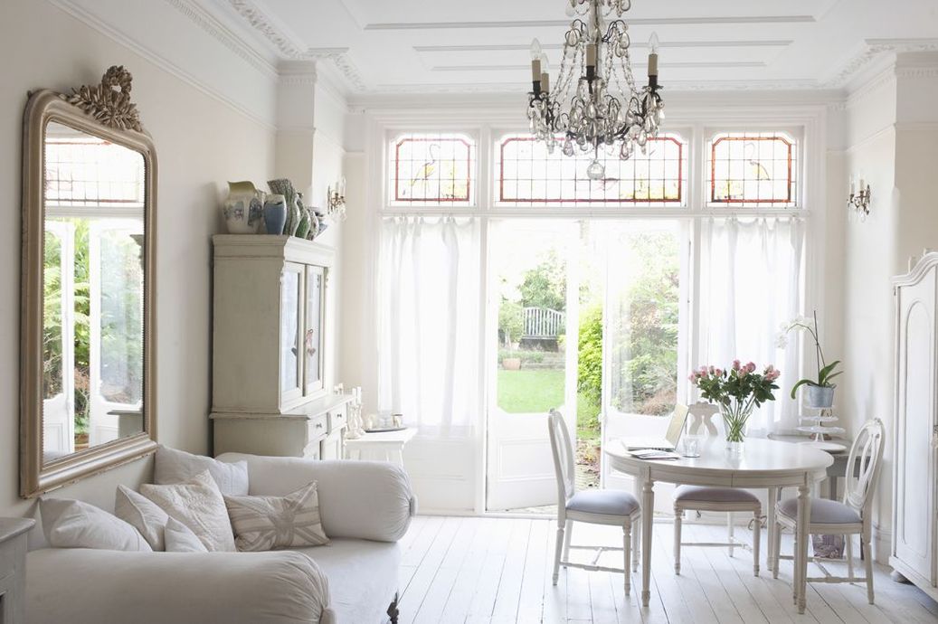Bright living room with windows and seating